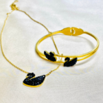 DUCK PENDANT AND BRACELET